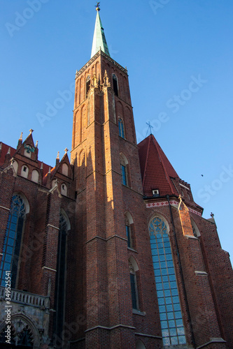 church, architecture, cathedral, religion, building, tower, catholic, old, landmark, sky, city, europe, travel, france, religious, gothic, blue, cross, worship, tourism, historic, basilica, brick