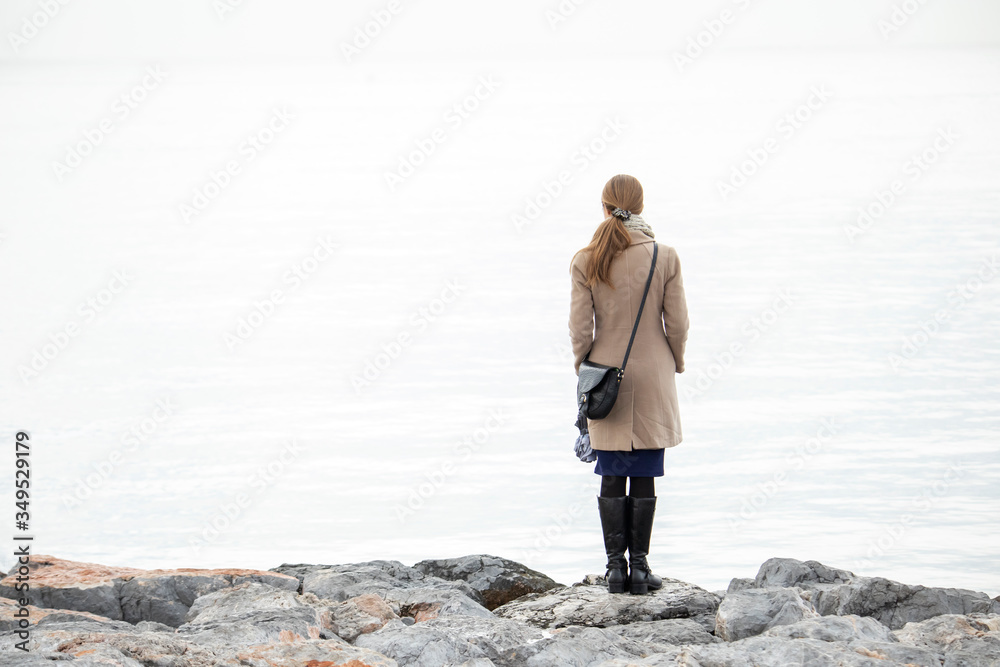 Back of lonely woman Back of lonely woman