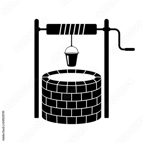 Well and bucket icon. Vector illustration of an old stone well. Brick sump.
