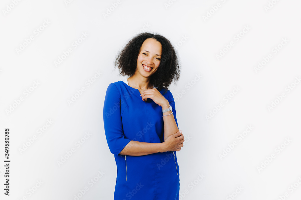 portrait of cheerful black woman in blue dress portrait of cheerful black woman in blue dress