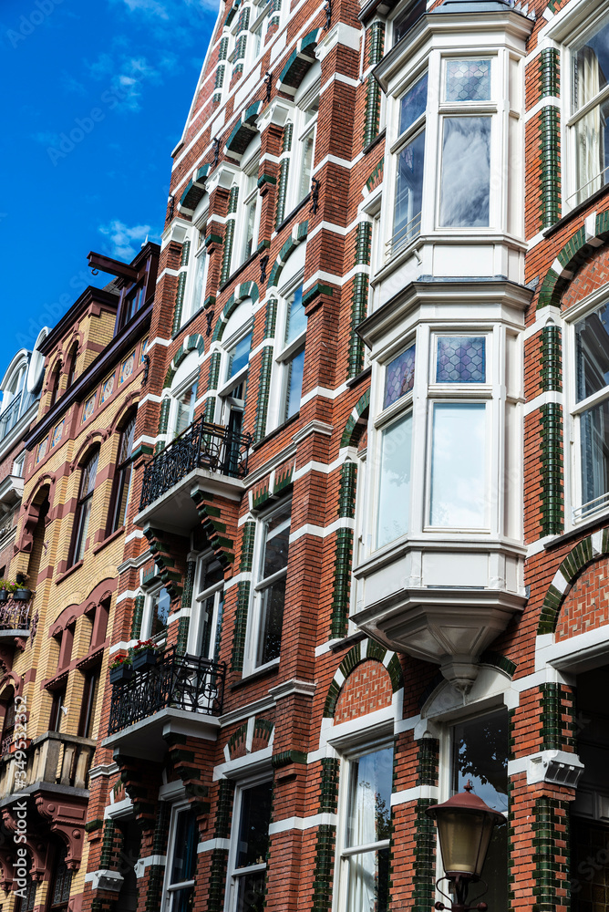 Obraz premium Old classic houses in Amsterdam, Netherlands