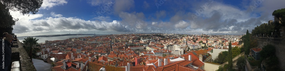 view of Lisbon from Castelo de S. Jorge  - November 2019 - blue sky, sun and clouds