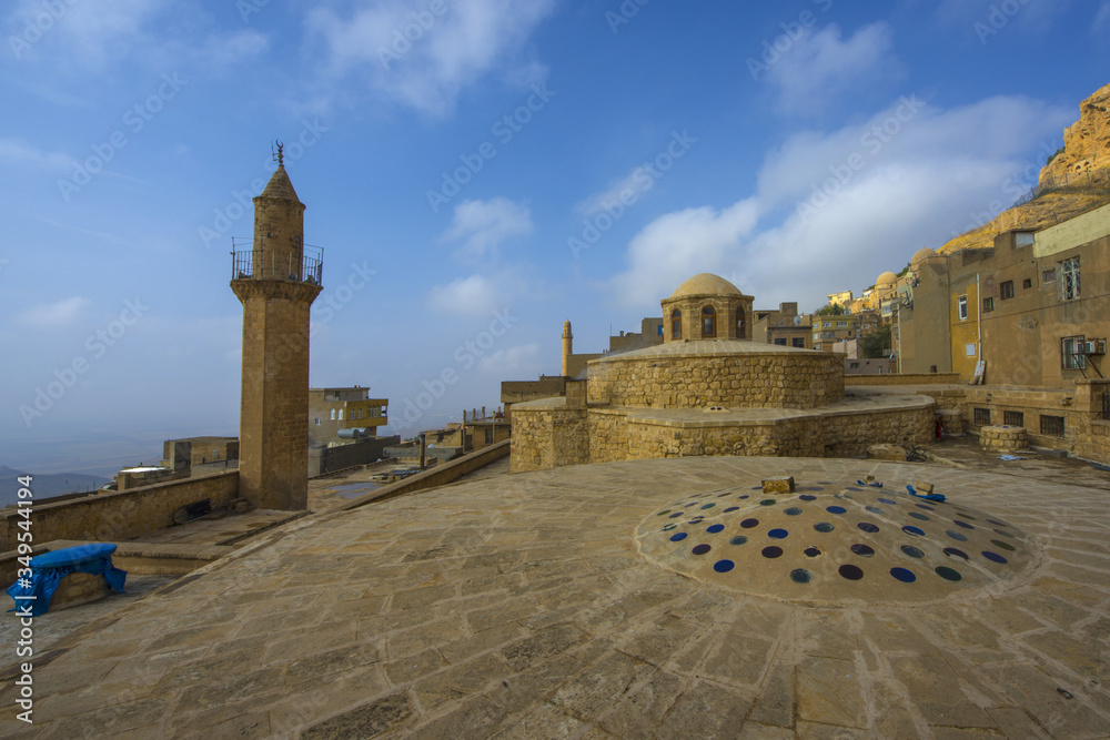 Mardin city in Turkey. Zinciriye Madrasa and Mardin view.