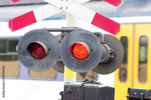 Fotografie Red stop signal at a level crossing