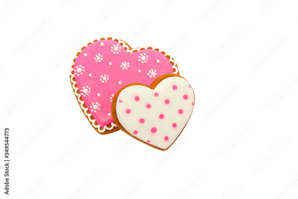 background from pink cookies heart shaped with different patterns, isolated