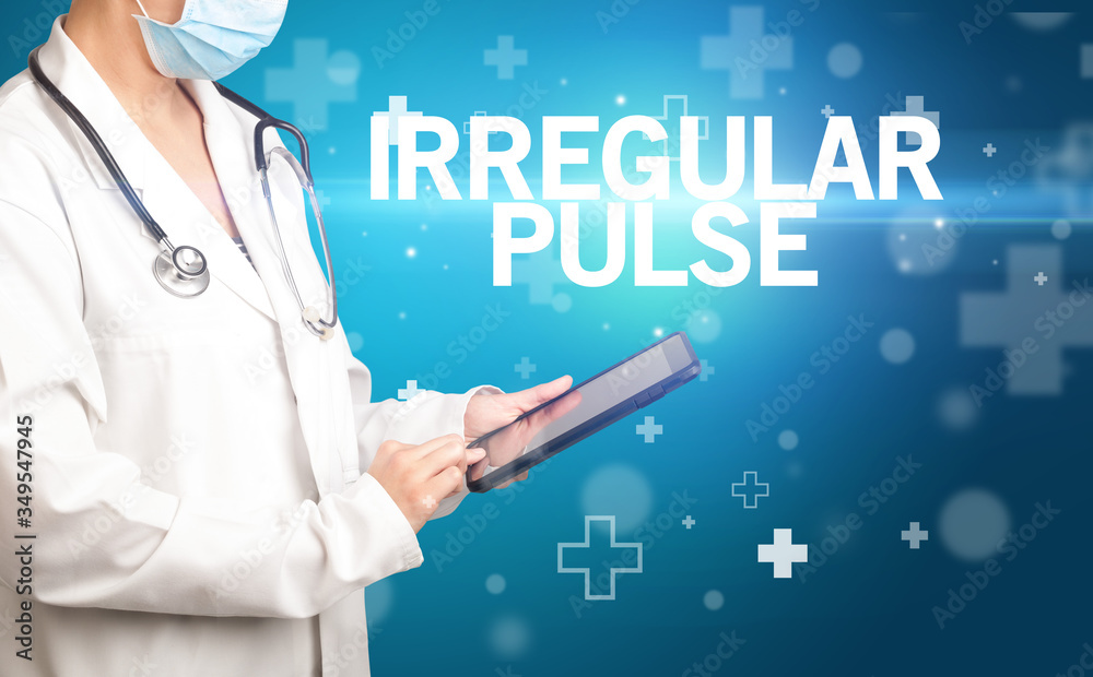 doctor writes notes on the clipboard with IRREGULAR PULSE inscription, first aid concept doctor writes notes on the clipboard with IRREGULAR PULSE inscription, first aid concept