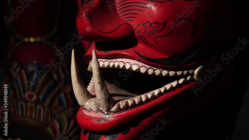 red javanese demon mask in indonesia photo