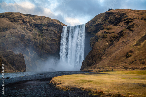 Stunning view of the famous Skogafoss waterfall  Iceland. Hydro energy. Power of water.