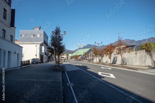 Beautiful scene of empty road in midtown of Nikko with clear blue sky for background , copy space