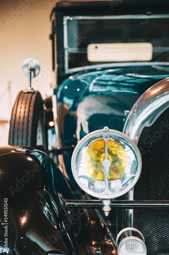 Close Headlamp Of Black Retro Vintage Oldtimer Car photo