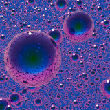 Iridescent Bubbles on Blue. Abstract 3D Render Background.