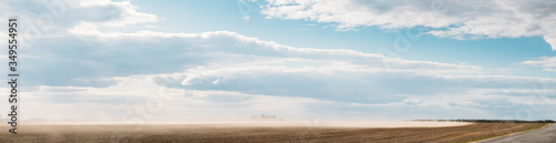Belarus, Europe. Spring Dust Storm. A Dust Cloud From Agricultural Field Envelops Landscape