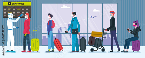 Airport health security for Covid-19. A medical staff with protective equipment takes the temperature of the passengers before boarding in the airport.