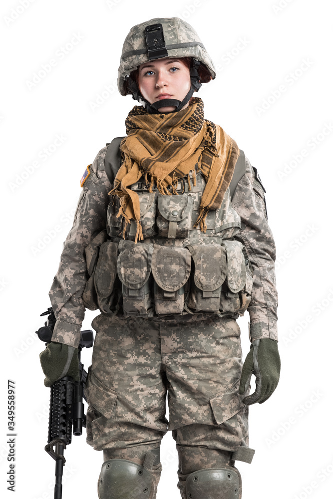 Female in US Army soldier (ISAF) with rifle. Shot in studio. Isolated with clipping path on white background
