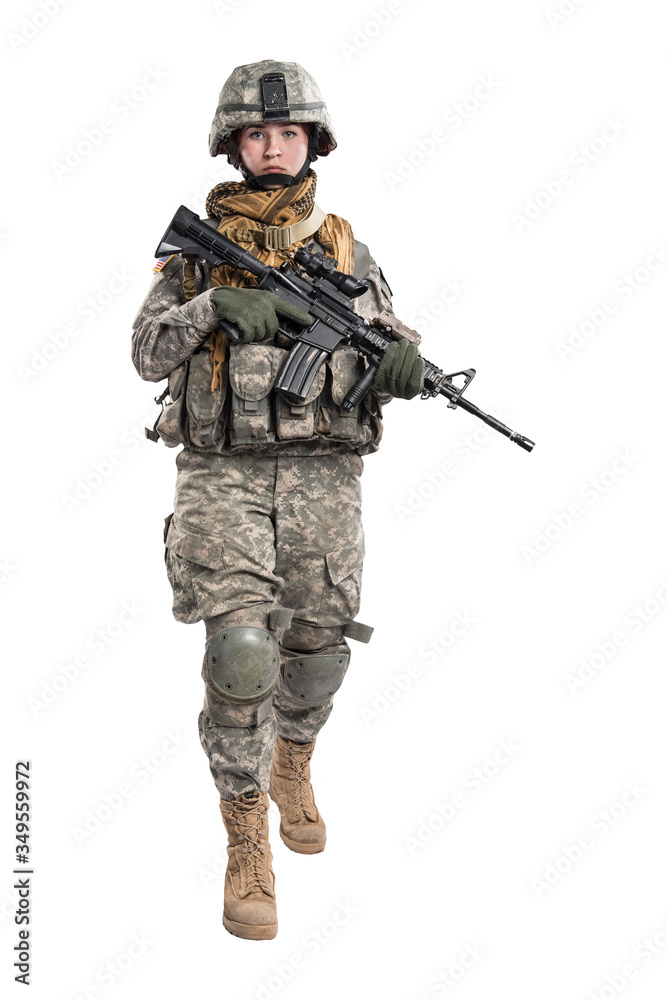 Female in US Army soldier (ISAF) with rifle. Shot in studio. Isolated with clipping path on white background