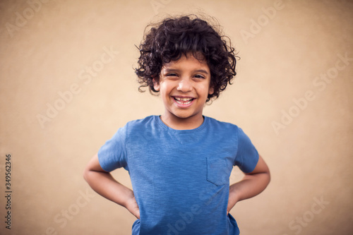 A portrait of happy kid boy. Children and emotions koncept