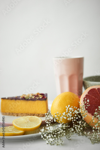 Piece of cake and fruits