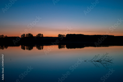 Beautiful morning with rising sun on lake