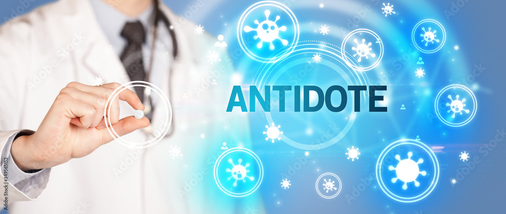Doctor giving pill with ANTIDOTE inscription, coronavirus concept Doctor giving pill with ANTIDOTE inscription, coronavirus concept