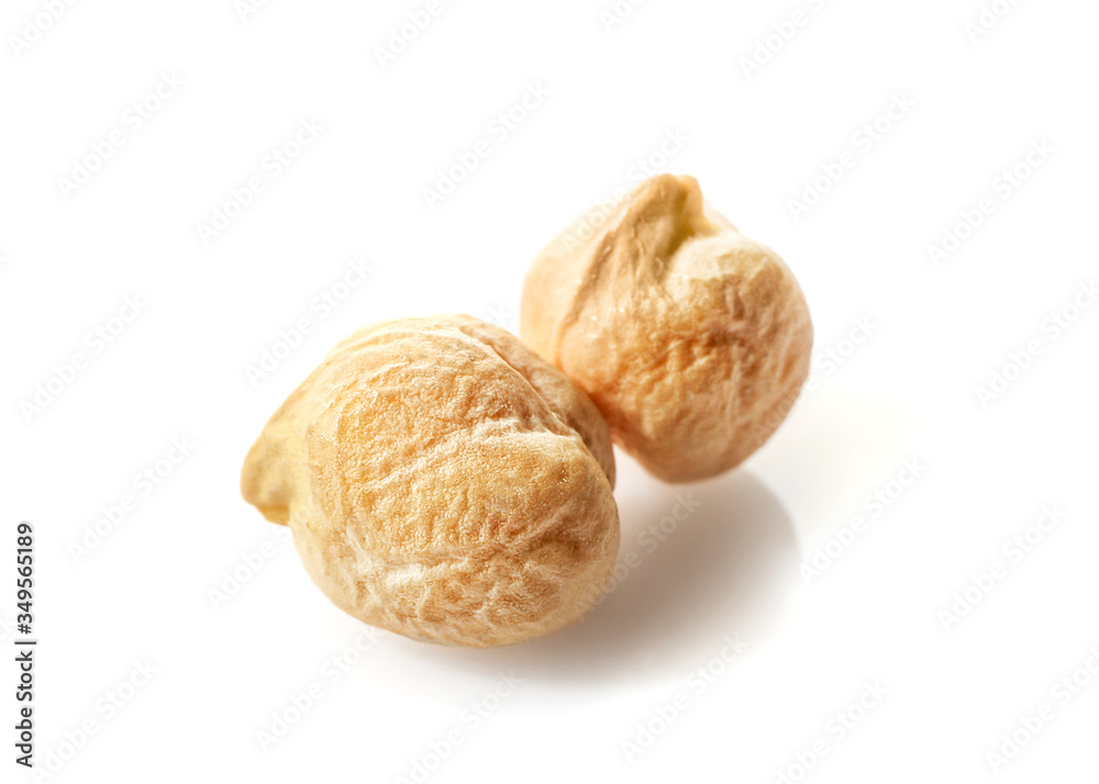 Few chickpeas isolated on white background. Few chickpeas isolated on white background.