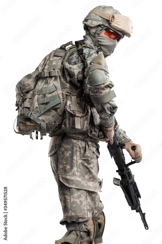 Male in US Army uniform soldier (Flag of the USA on the shoulder). Shot in studio. Isolated with clipping path on white background
