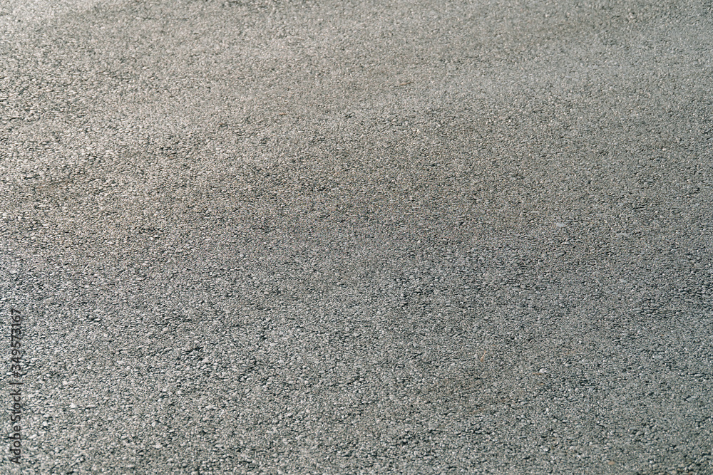 Seamless tarmac dark grey grainy road. Texture background Seamless tarmac dark grey grainy road. Texture background
