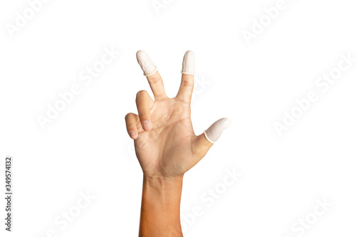 Fotografía Finger cots is on the fingers to help prevent fingerprints on the finger touched piece