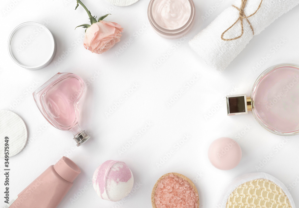 Home spa. Self-care in quarantine and self-isolation. Treat yourself. Luxury treatments, parfume, towels pink rose,bath salt, rose water isolated on white Home spa. Self-care in quarantine and self-isolation. Treat yourself. Luxury treatments, parfume, towels pink rose,bath salt, rose water isolated on white