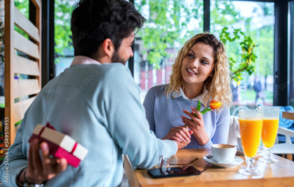 Romantic couple in the cafe. Dating, love, relationships Romantic couple in the cafe. Dating, love, relationships