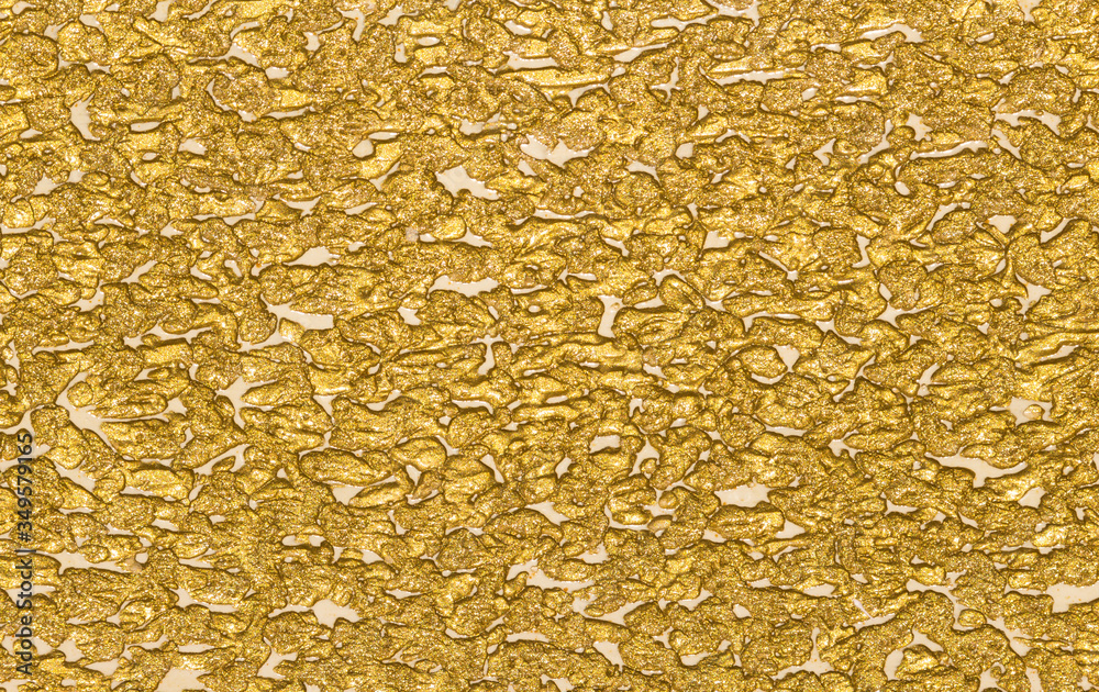textured background of gold color textured background of gold color