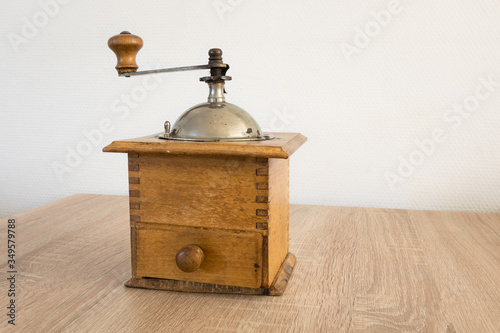 Ancient coffee grinder on a table