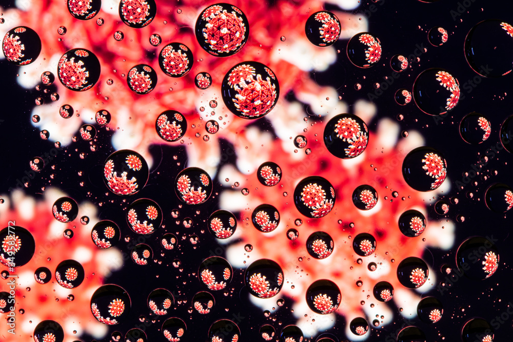 Image of a coronovirus through drops of water on glass