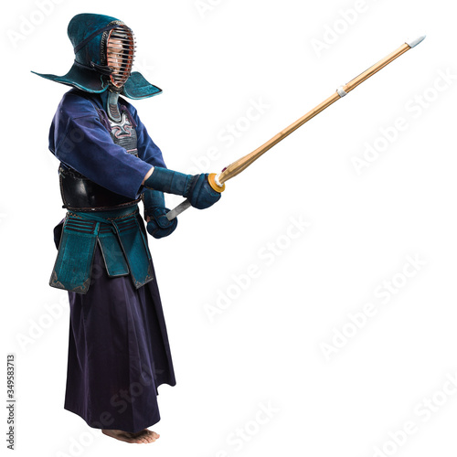 Portrait of man kendo fighter with shinai (bamboo sword). Shot in studio. Isolated with clipping path on white background photo