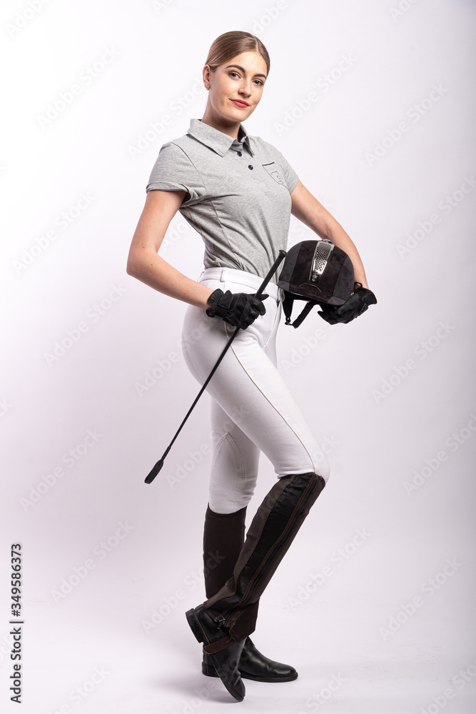 Beautiful blonde horsewoman. White background.