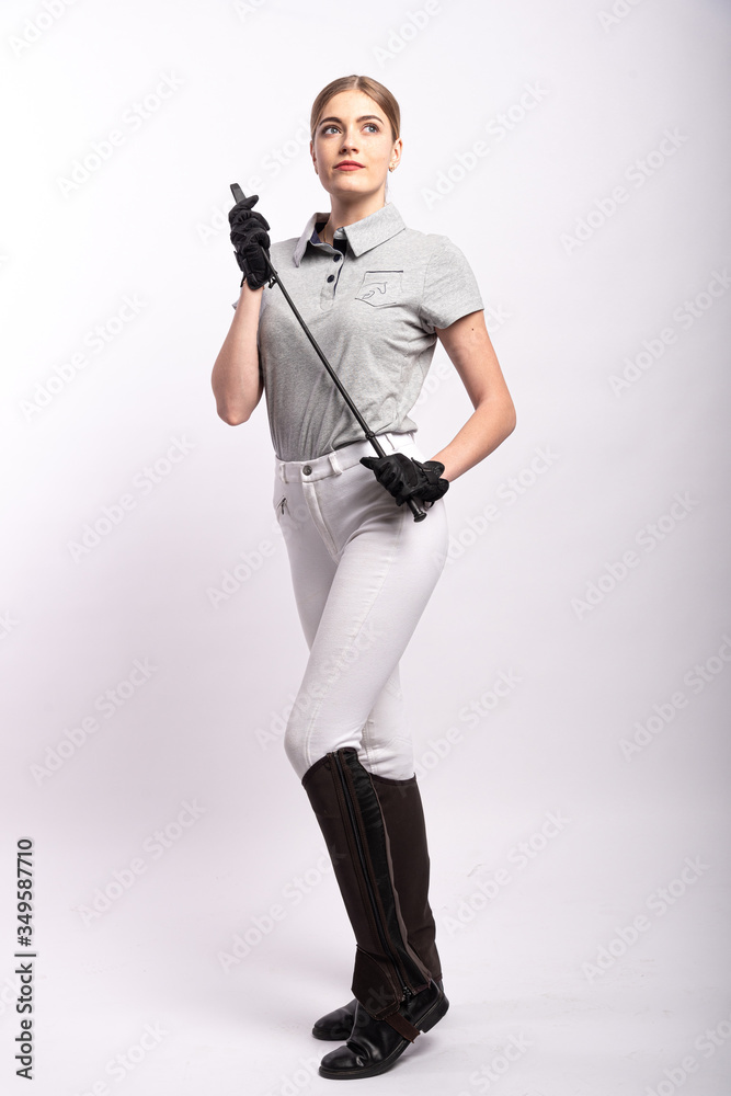 Beautiful blonde horsewoman. White background. Beautiful blonde horsewoman. White background.