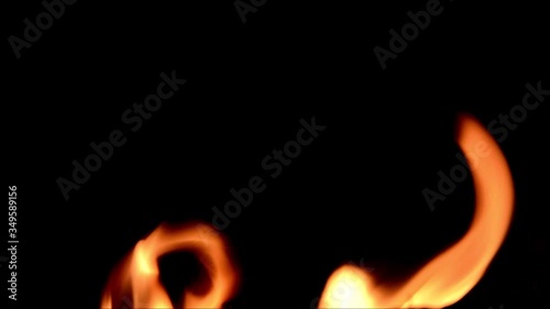 Orange flames of fire on black background