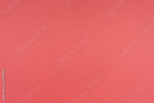 Red concrete wall texture background.