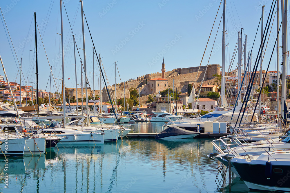 Marina yachts and buildings on background in Cesme