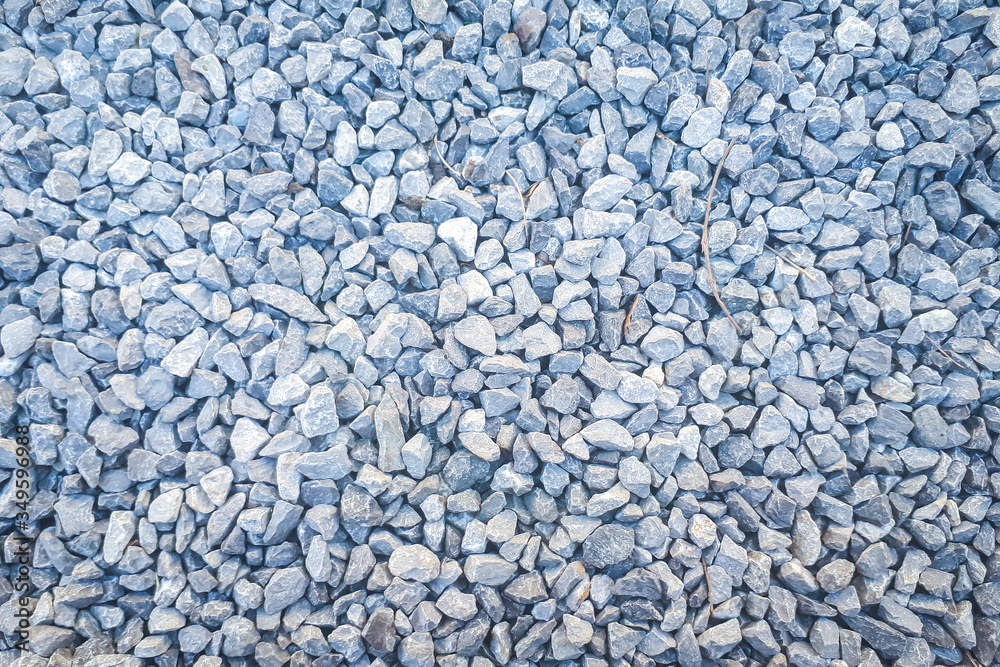 dark gravel pebbles stone texture. Gravel road background. dark gravel pebbles stone texture. Gravel road background.