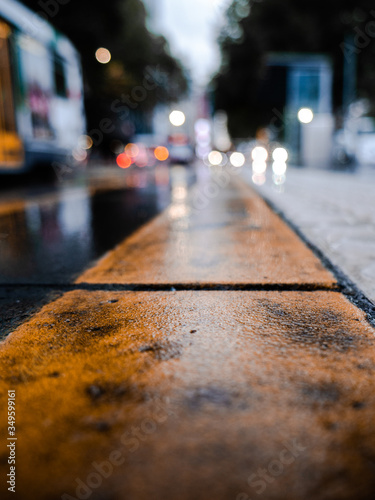Bokeh and details of rainy day city concrete ground