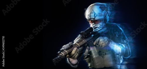 US marine corps soldier coming out from holographic projection on black background. (future technology military concept)
