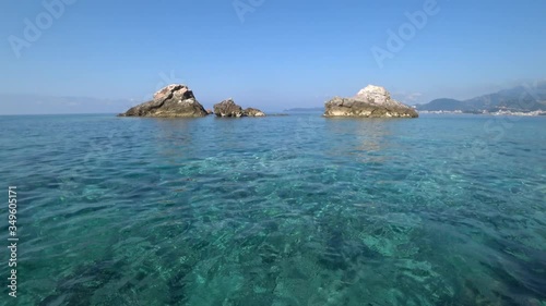 Panorama of the calm Adriatic Sea from Galija beach. View of the Budvanska Riviera. photo