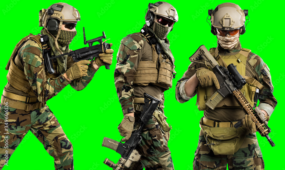 Fototapeta premium US marine corps soldier with rifle. Shot in studio. Isolated with clipping path on green chroma key background