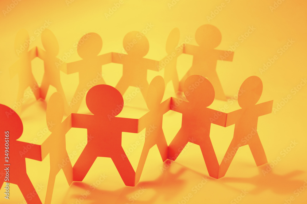 Paper chain orange team united together Paper chain orange team united together