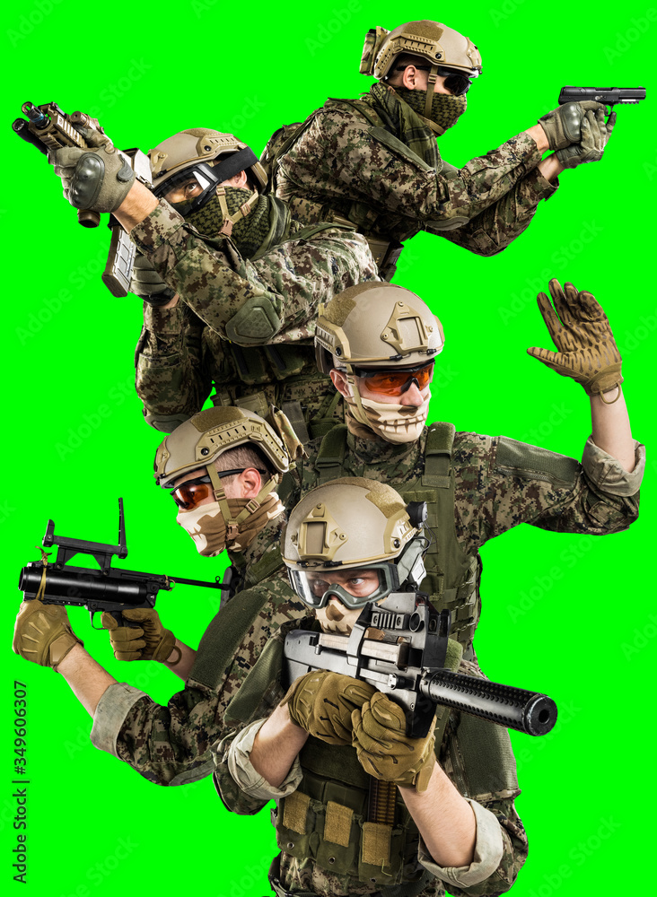 Fototapeta premium Male in uniform of Tactical Units of Police with submachine gun P90. Shot in studio. Isolated with clipping path on green chroma key background