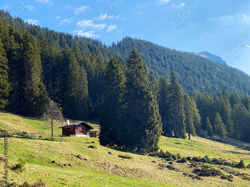 Traditional rural architecture and family livestock farms on the slopes of the Pilatus mountain massif, Alpnach - Canton of Obwalden, Switzerland (Kanton Obwalden, Schweiz) photo