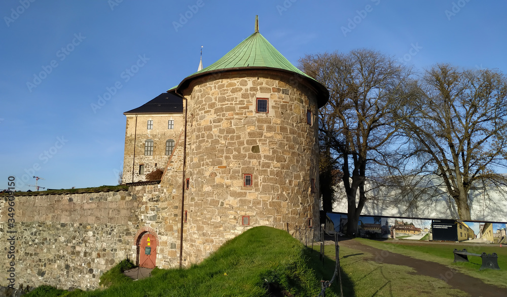 High old tower in the Akershus Fortress. Oslo, Norway. Autumn sunny day.