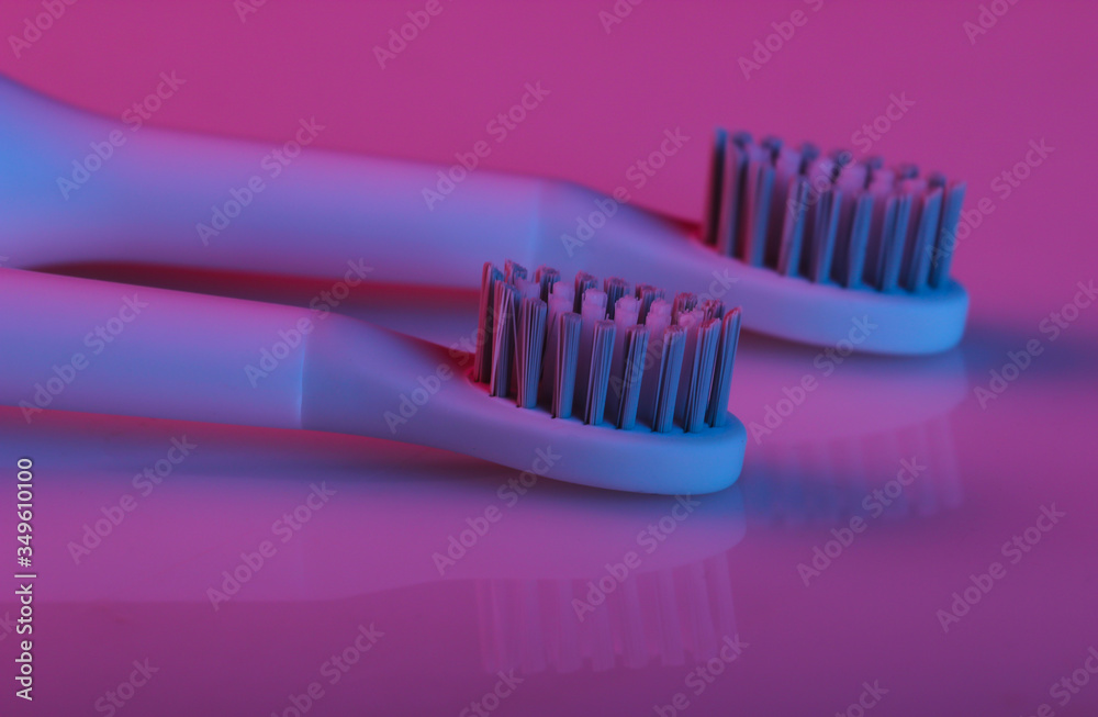 Toothbrush head with pink blue gradient neon light Toothbrush head with pink blue gradient neon light