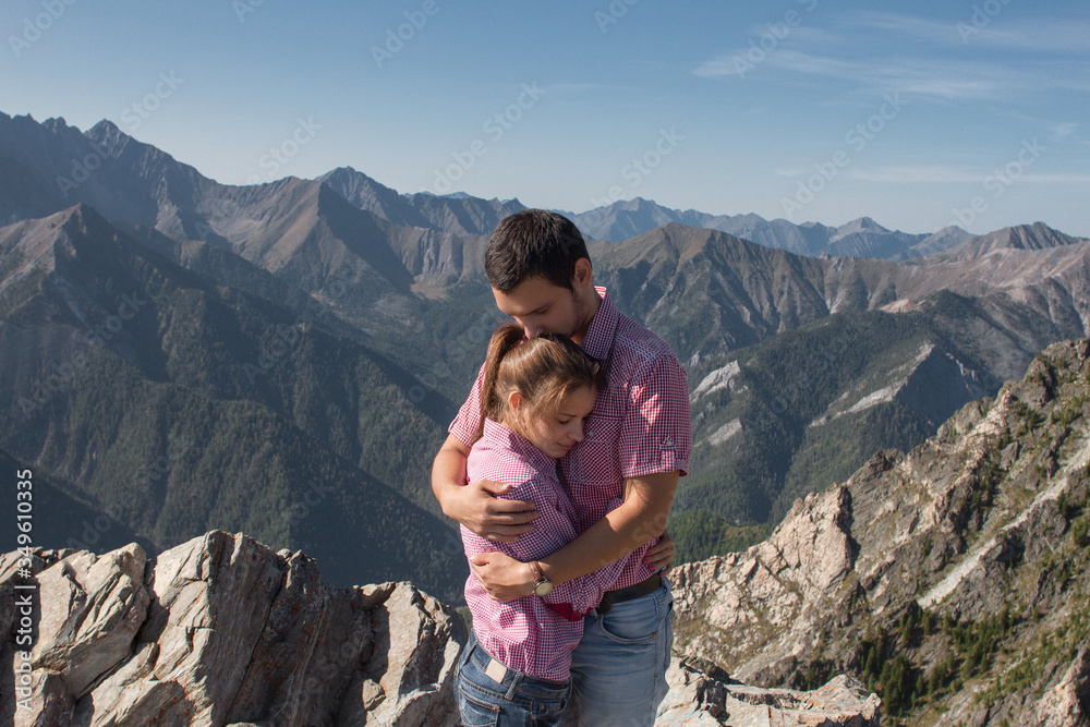 travel loving couple on mountain top