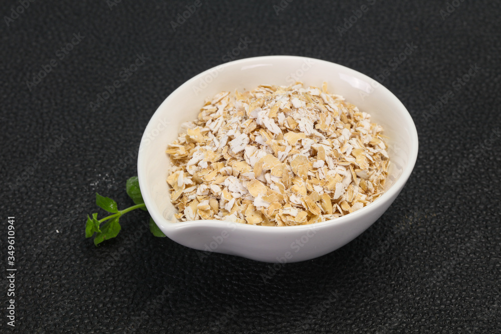 Raw oats in the bowl Raw oats in the bowl